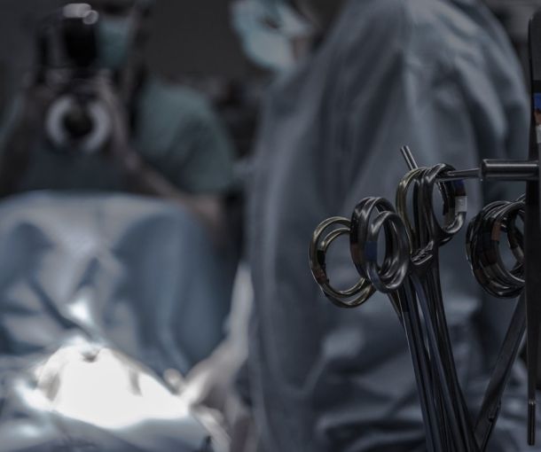 Surgical team in operating theatre during knee replacement procedure