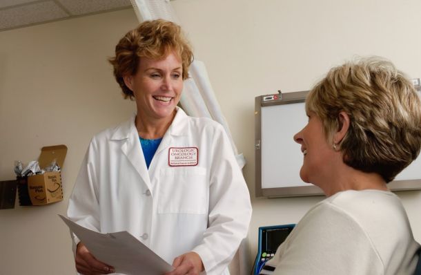 Consultant and patient in discussion during outpatient clinic appointment