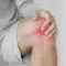 Illustration of a knee joint highlighting joint damage